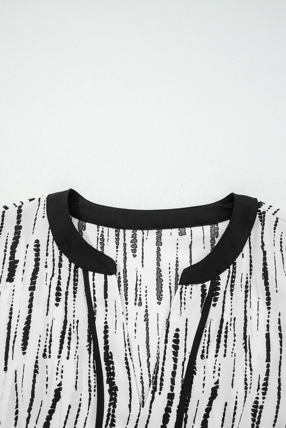 White Abstract Printed V Neck Fall Blouse