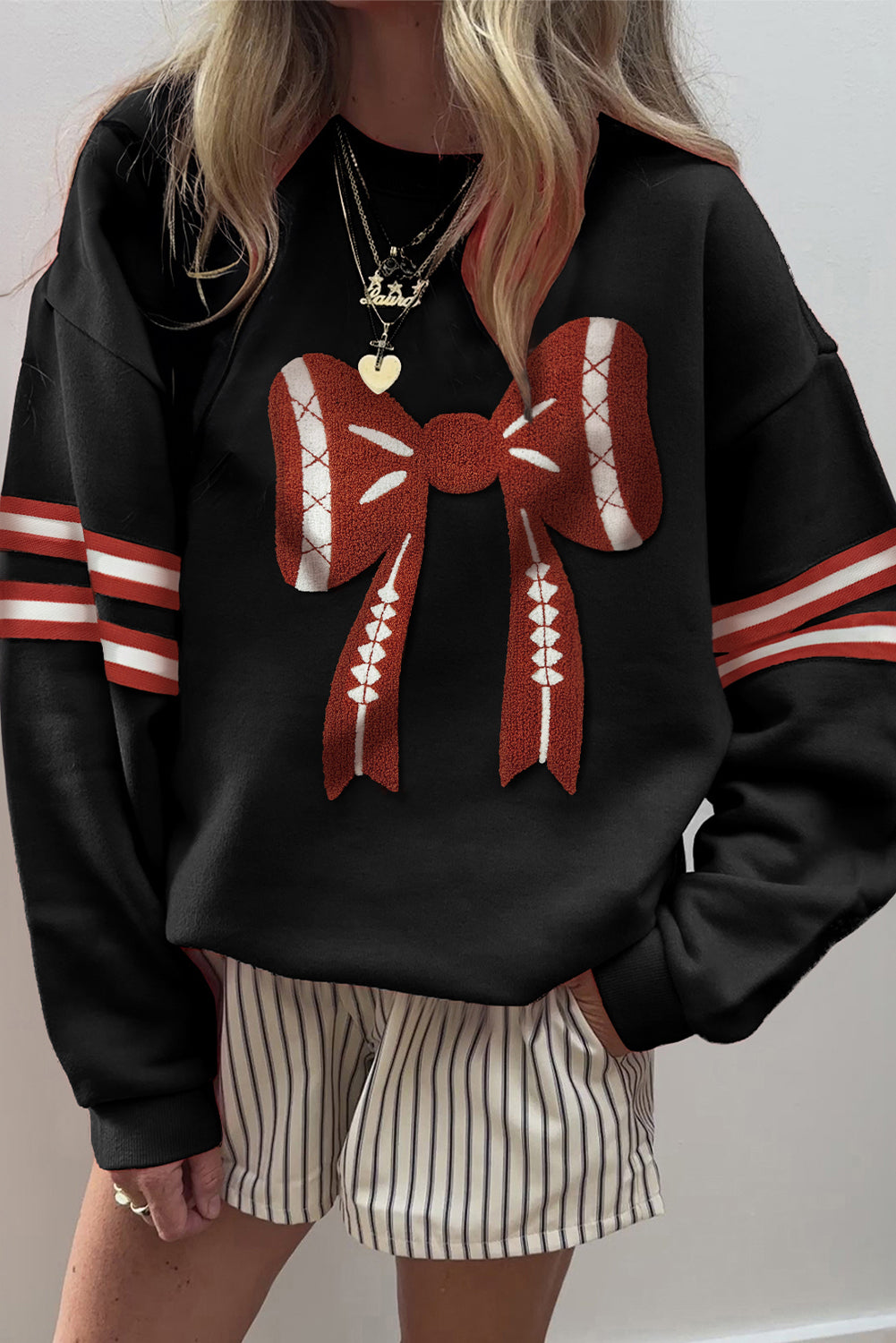 Black Varsity Baseball Bow Graphic Striped Sleeve Baggy Sweatshirt