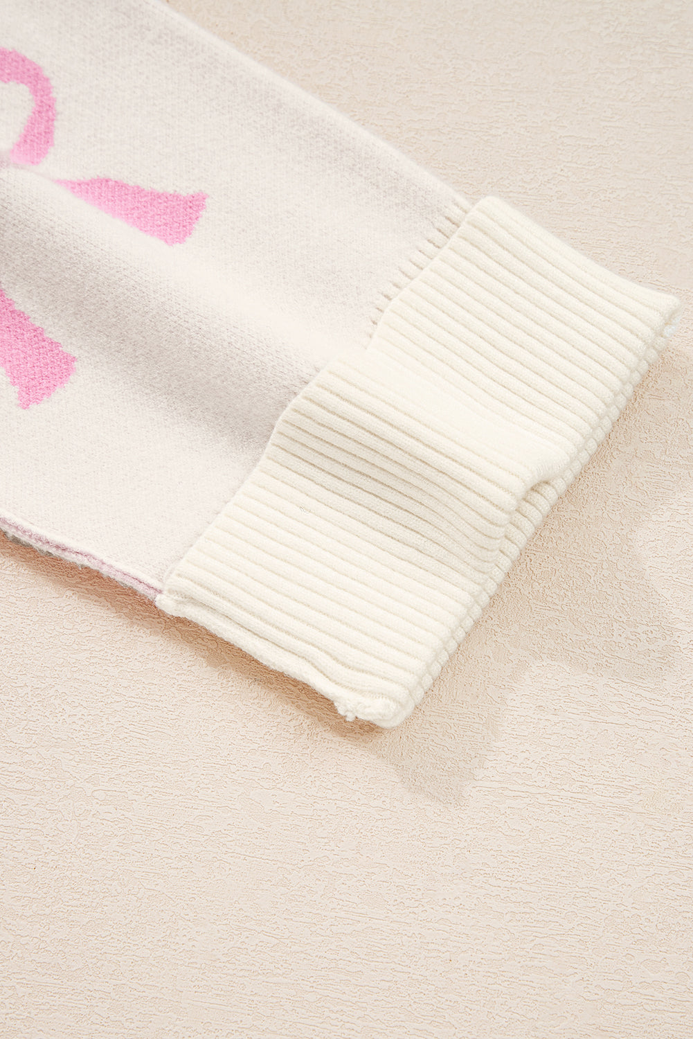 Pink Bow Print Ribbed Trim Exposed Seam Drop Shoulder Loose Sweater