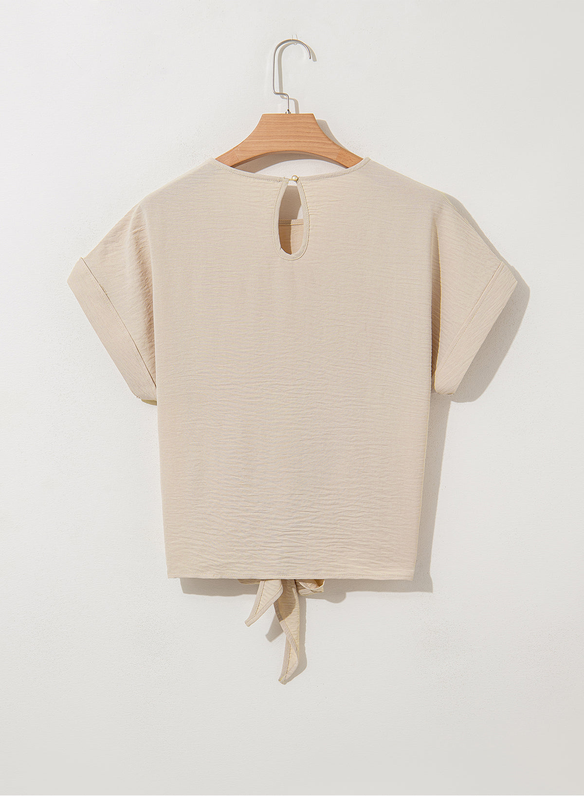 Parchment Solid Color Knotted Hem Short Sleeve Blouse