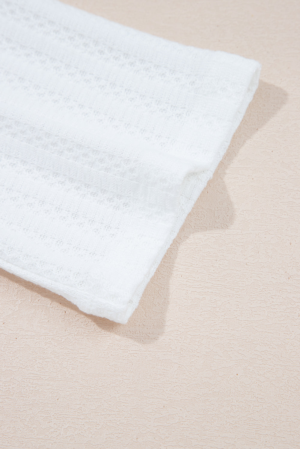 White Textured Hollow Grommet Placket Split Neck Short Sleeve Top