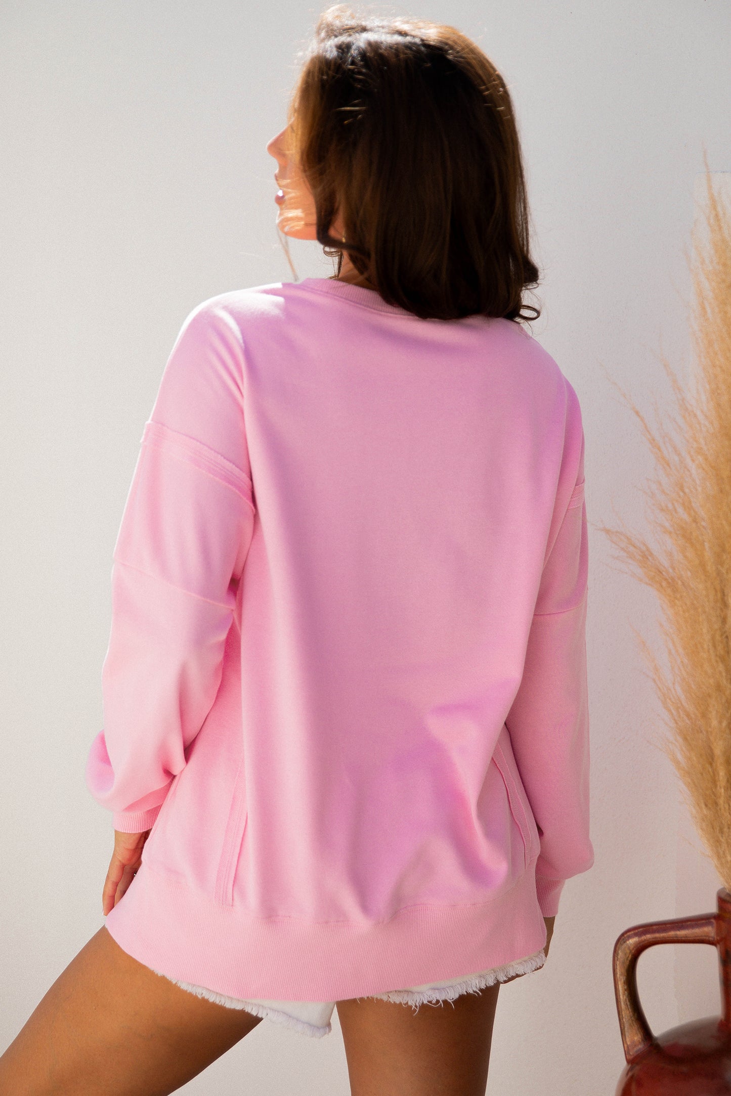 Black Bow Sequin XOXO Letter Graphic Exposed Seam Baggy Sweatshirt