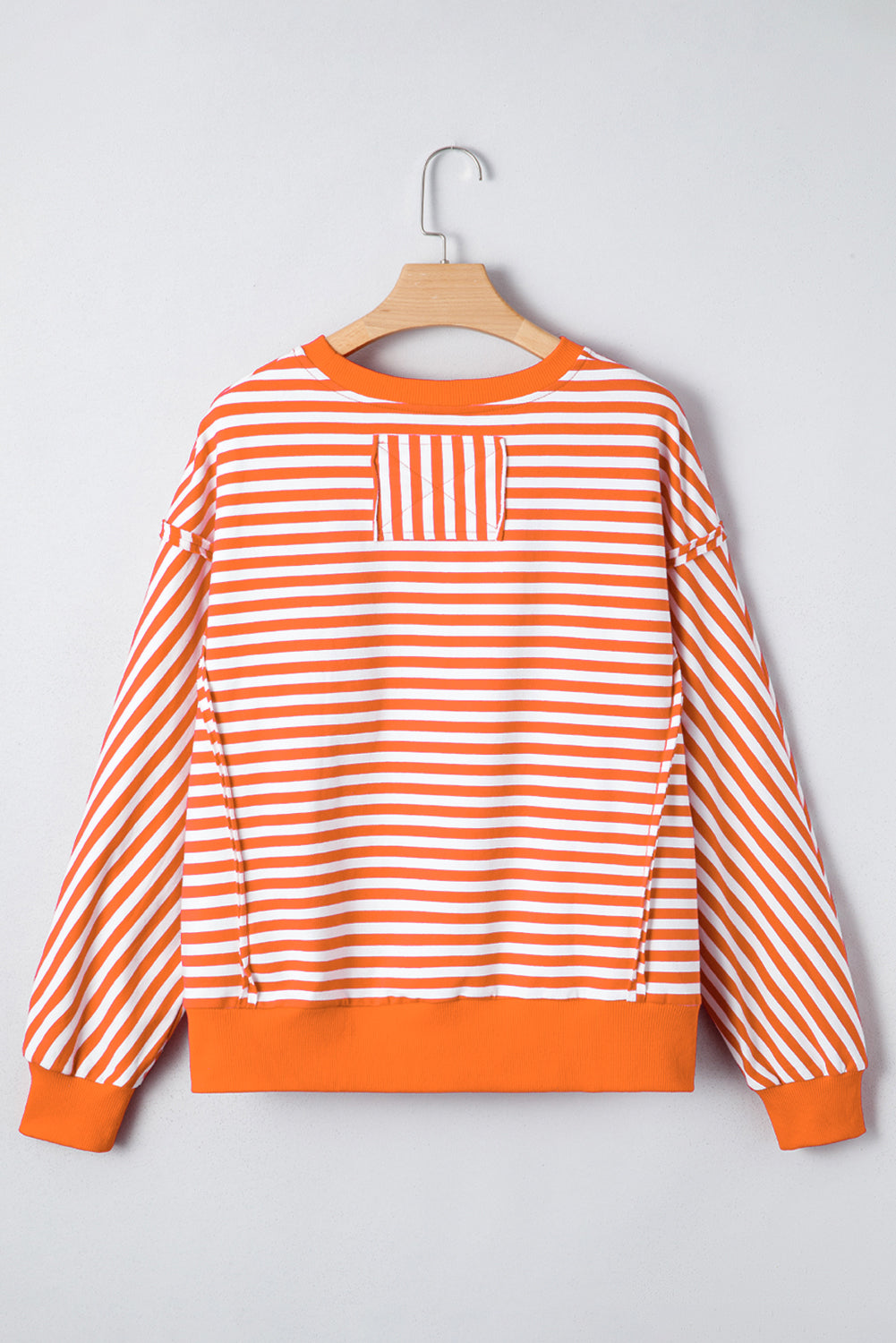 Orange Stripe Exposed Seam Drop Shoulder Casual Pullover Top